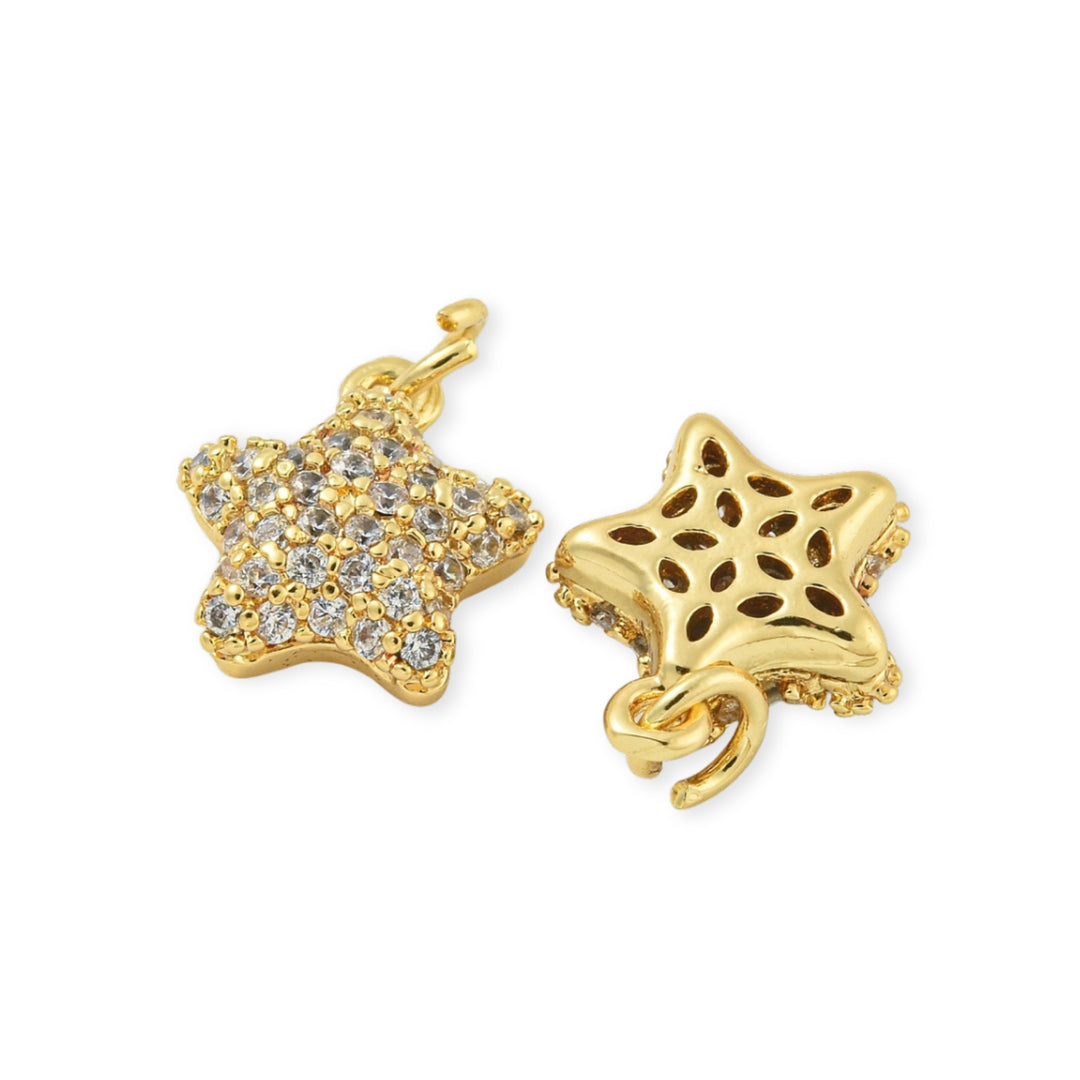 Detalles de Dije dorado en forma de estrella con zirconia