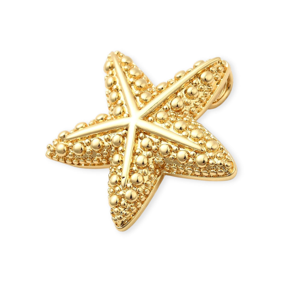 Detalles de Dije dorado en forma de estrella de mar con ojal trasero