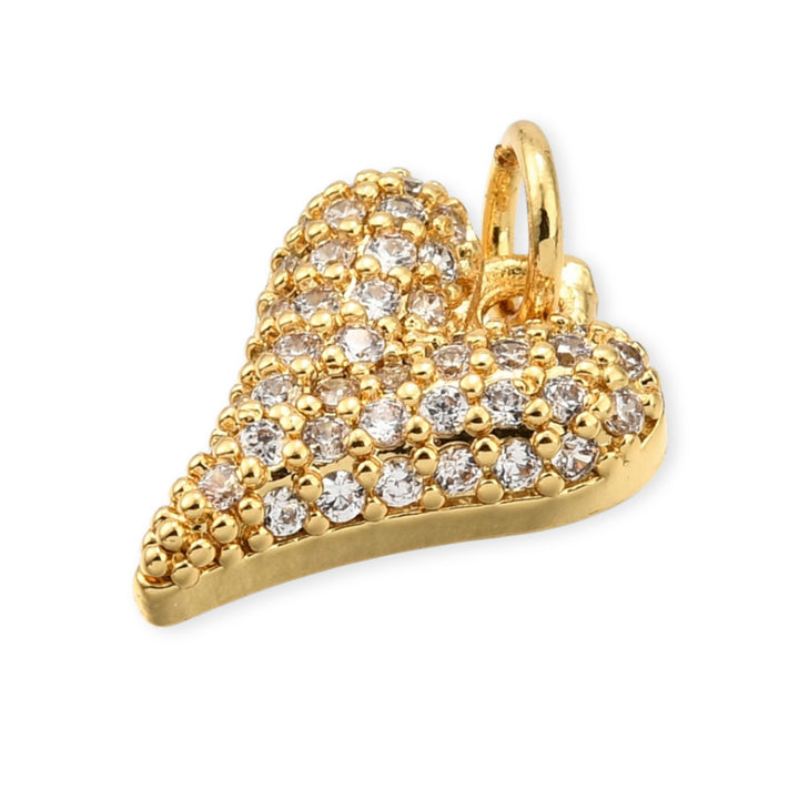Detalles de Dije en forma de corazón dorado con zirconia