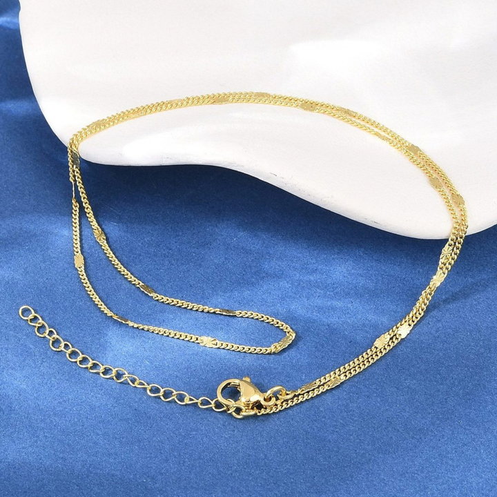 Detalles de Cadena de chapa de oro con broche perico dorado