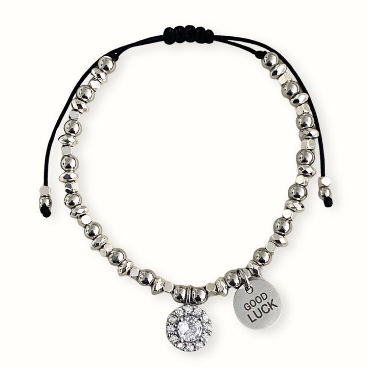 Brazalete de hematita con dije Good Luck y dije circular con zirconia