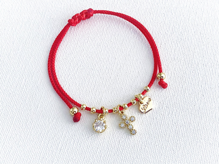 Pulsera Alba de hilo rojo con perla y cruz de zirconia

