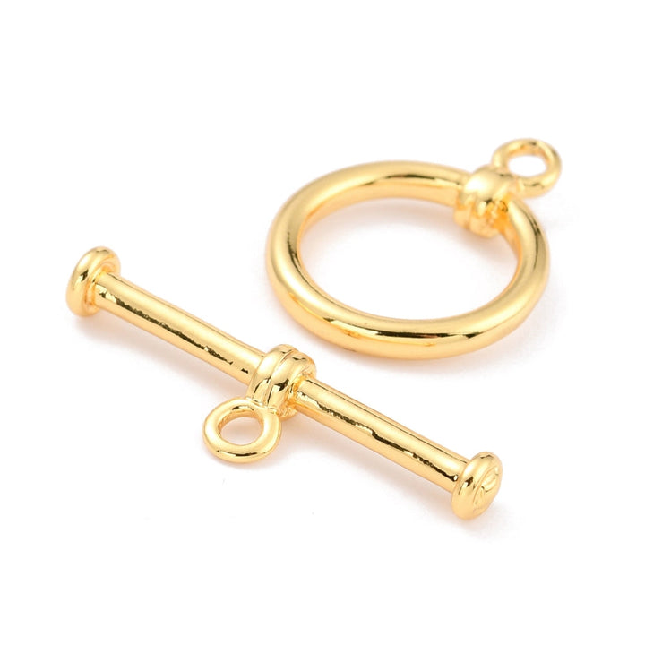 Broche "T" de chapa de oro en perspectiva